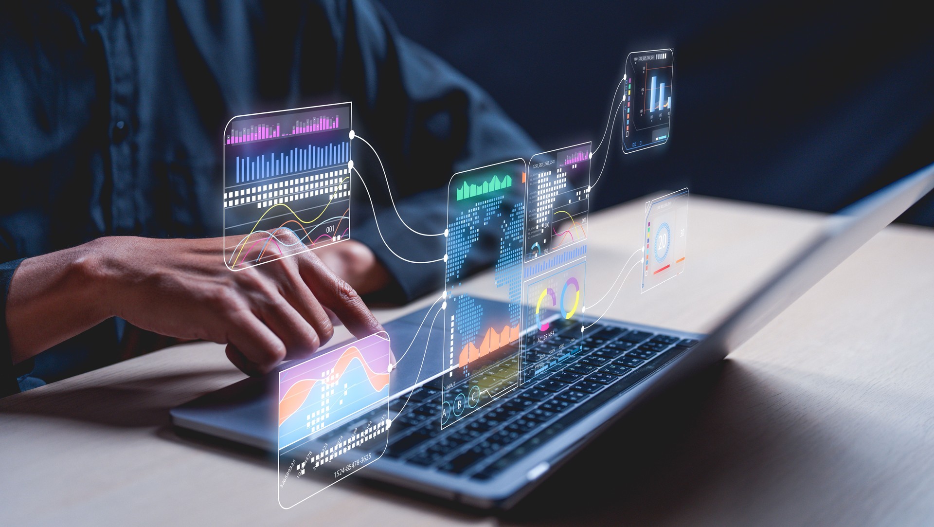 Businessman works on laptop Showing business analytics dashboard by ai with charts, metrics, and KPI to analyze performance and create insight reports for operations management. Data analysis concept.
